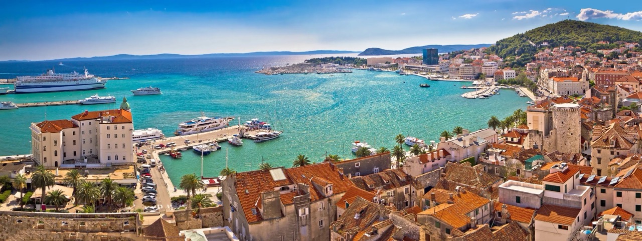 The cityscape of Split, Croatia, featuring ancient Roman ruins and vibrant waterfront along the Adriatic coast