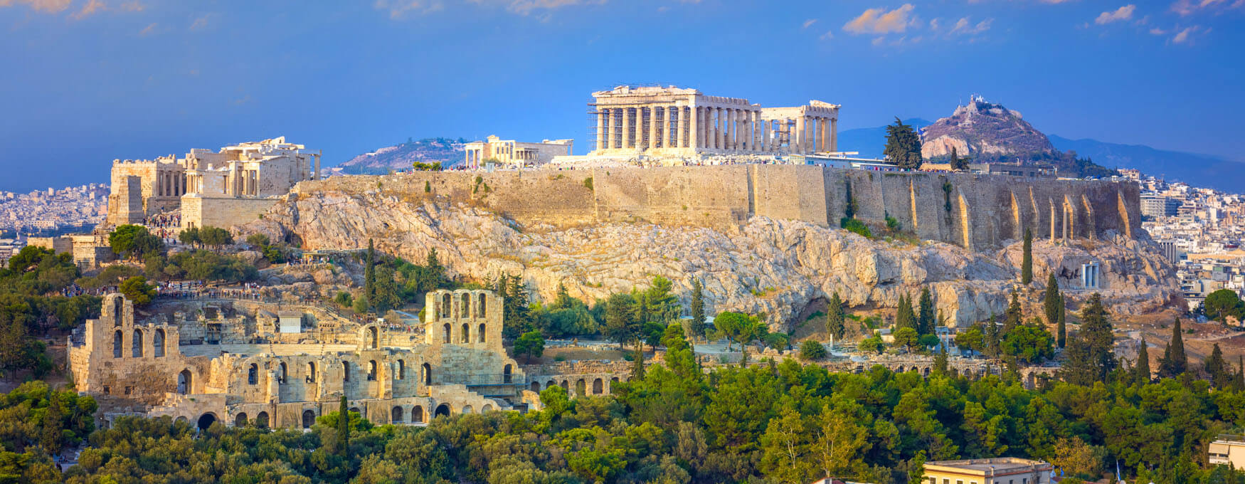 The Acropolis of Athens, Greece, showcasing ancient ruins against a clear blue sky