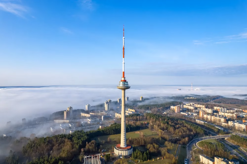 Aerial beautiful spring morning fog view of Vilnius TV Tower Lithuania